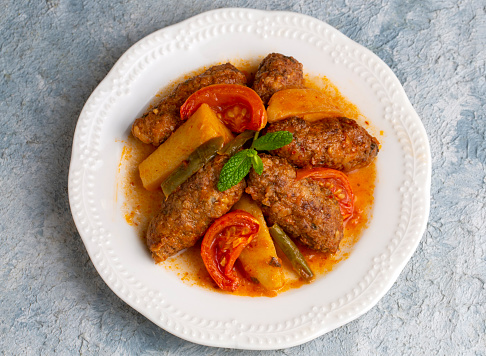 Traditional Homemade Turkish Food Kofte - Kofta with Tomato Sauce and Potatoes