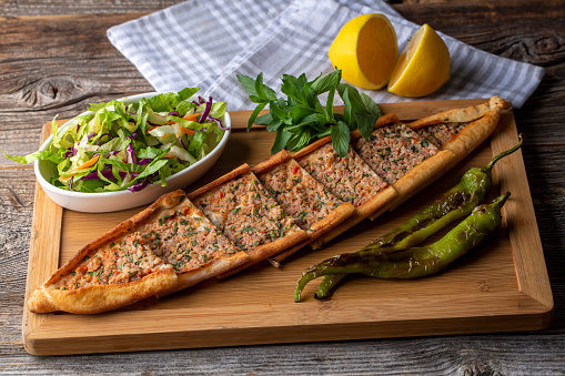 Turkish pide with minced meat, Turkish name; Kiymali Pide. Traditional Turkish cuisine. Turkish pizza Pita with meat